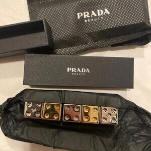Prada gold and silver dice set